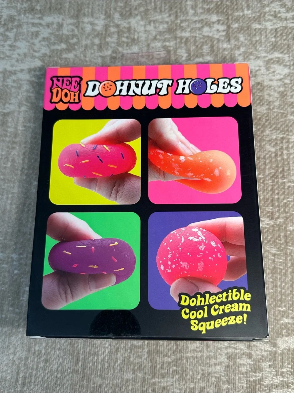 Schylling NeeDoh Donut Holes 4 pack Stress Balls - Pink, Orange & Purple